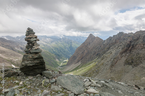 The stone pillar on a climbing route to Grossglockner rock summit in Austrian Alps, Kals am Grossglockner, Austria © almostfuture