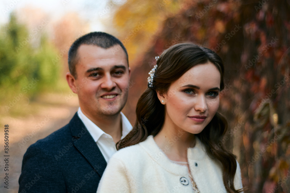 Couple in love close-up portrait. Concept of happy family. Modern family outdoor. Couple in love close-up portrait. Concept of happy family. Modern family outdoor.