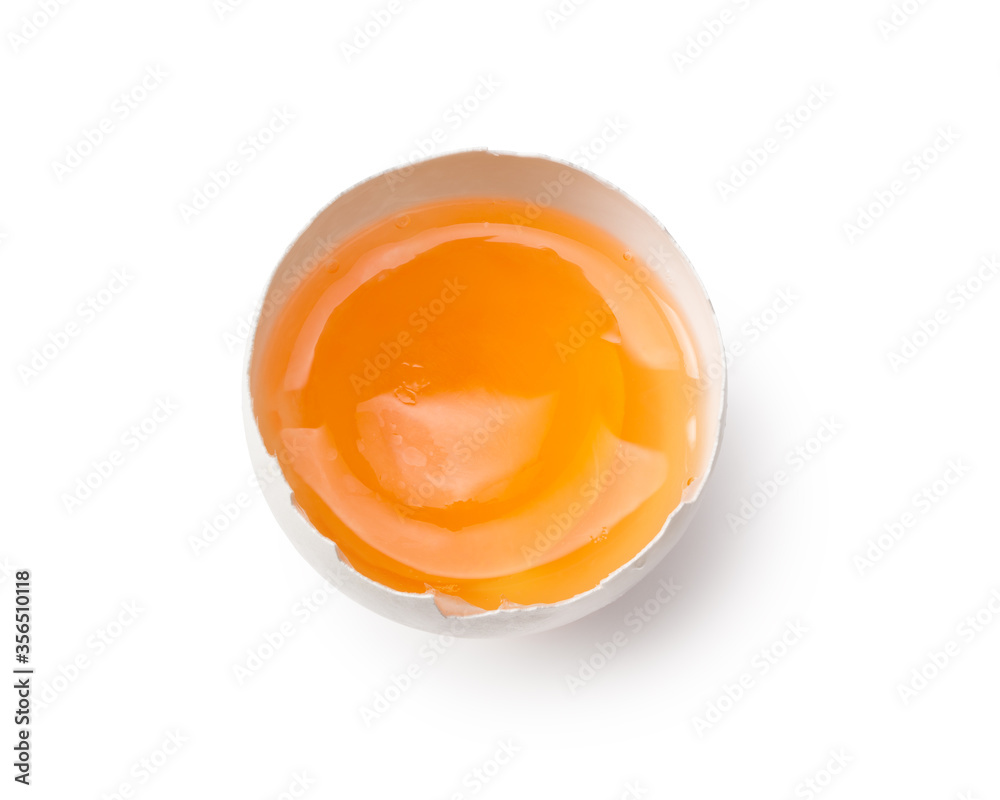 broken chicken egg isolated on a white background. Top view