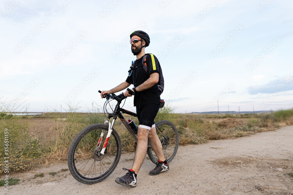 Fototapeta premium cyclist riding his mountain bike