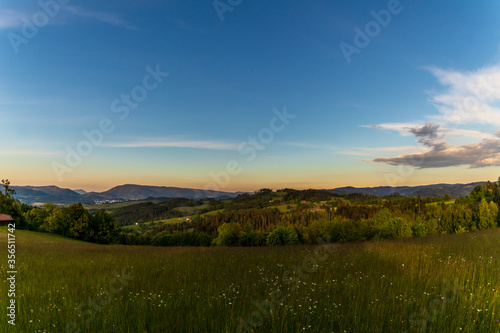View of nature surrounded by forest and in the sky full of clouds with a view of the mountain landscape around the Beskydy Mountains.