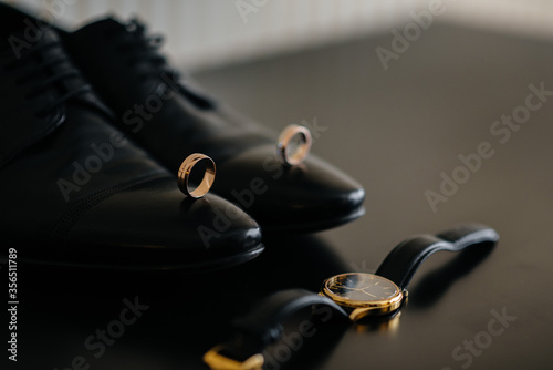 Stylish men's accessories close-up during the preparations for the wedding