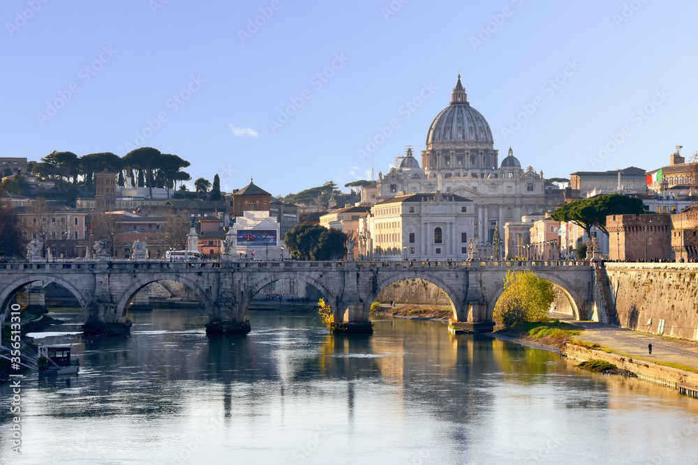 View on St. Peter's Basilica and Holy Angel bridge at dusk