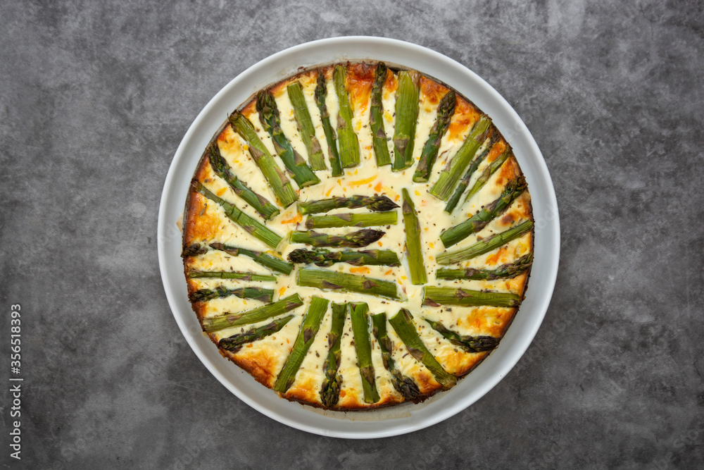 Asparagus tart pastry. Healthy pie filled with fresh asparagus. Vegan food.