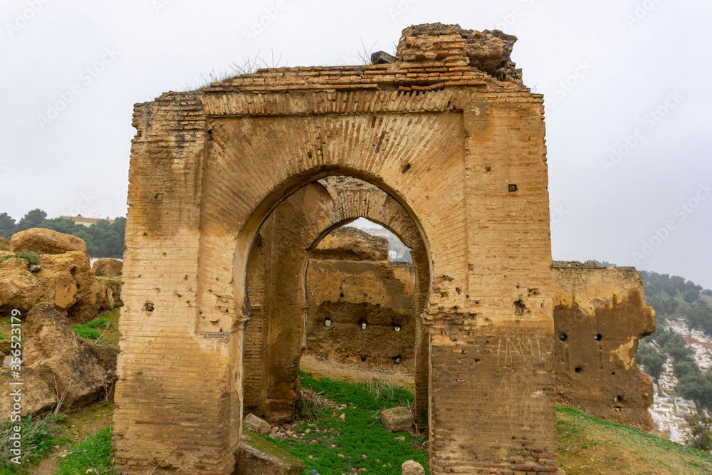 Ancient Marinid tombs and mausoleum ruins in Meknes, Morocco during various times of day.