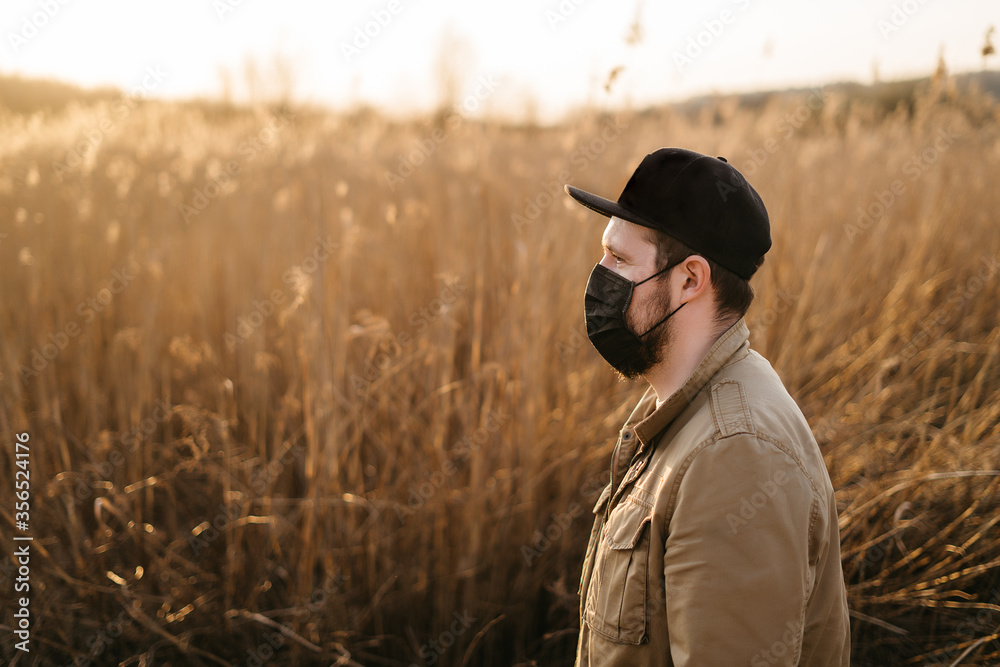 young guy in a protective mask