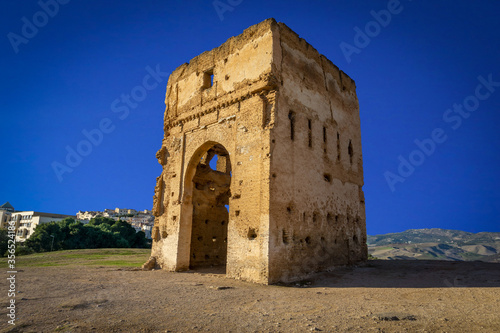 Ancient Marinid tombs and mausoleum ruins in Meknes, Morocco during various times of day. photo