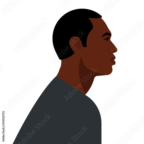 Beautiful black man. Young american man with short hair. Portrait of young man face. Side view. Isolated on a white background.