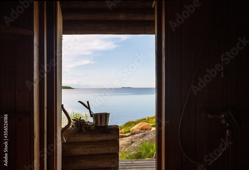 View from saunu door to the gulf of Bothnia, Finland photo