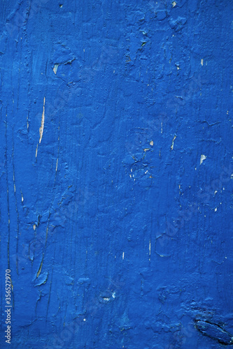 The board is wooden painted blue, the old texture of the painted board. High Quality
