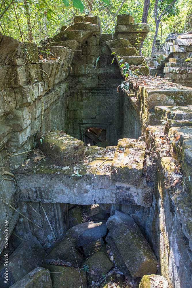 Beng Mealea Temple is a temple in the Angkor Wat style located east of the main group of temples at Angkor, Siem Reap, Cambodia. Beng Mealea Temple is a temple in the Angkor Wat style located east of the main group of temples at Angkor, Siem Reap, Cambodia.