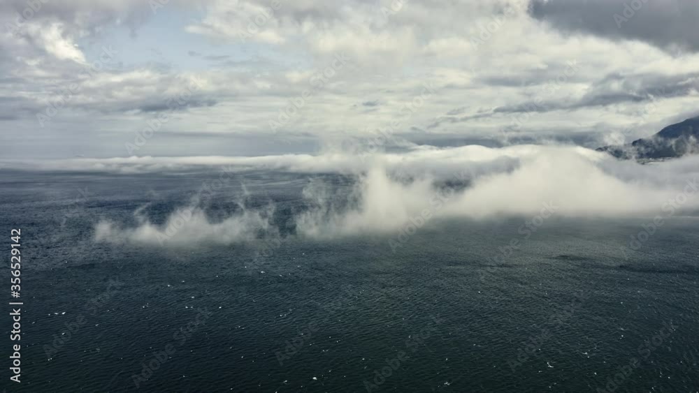 Blue Ocean and Skies with White Thick Fog in Between Blue Ocean and Skies with White Thick Fog in Between