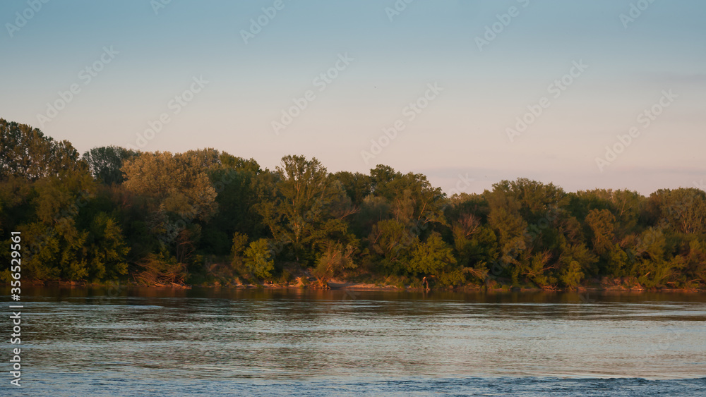 fine view by the water by the setting sun in the Vistula valley