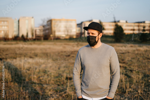 young guy in a protective mask 