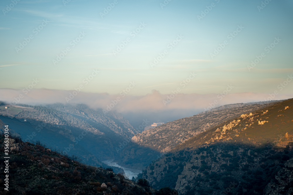 aerial view of mountains fog