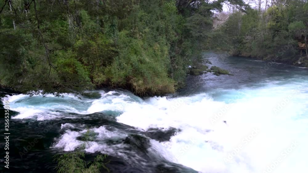 The wild white waters of Caburgua River flowing down and jumping at Carileufu rapids. An amazing scenery inside the south of Chile rainforest at Pucon, an idyllic landscape for some relax time
The wild white waters of Caburgua River flowing down and jumping at Carileufu rapids. An amazing scenery inside the south of Chile rainforest at Pucon, an idyllic landscape for some relax time