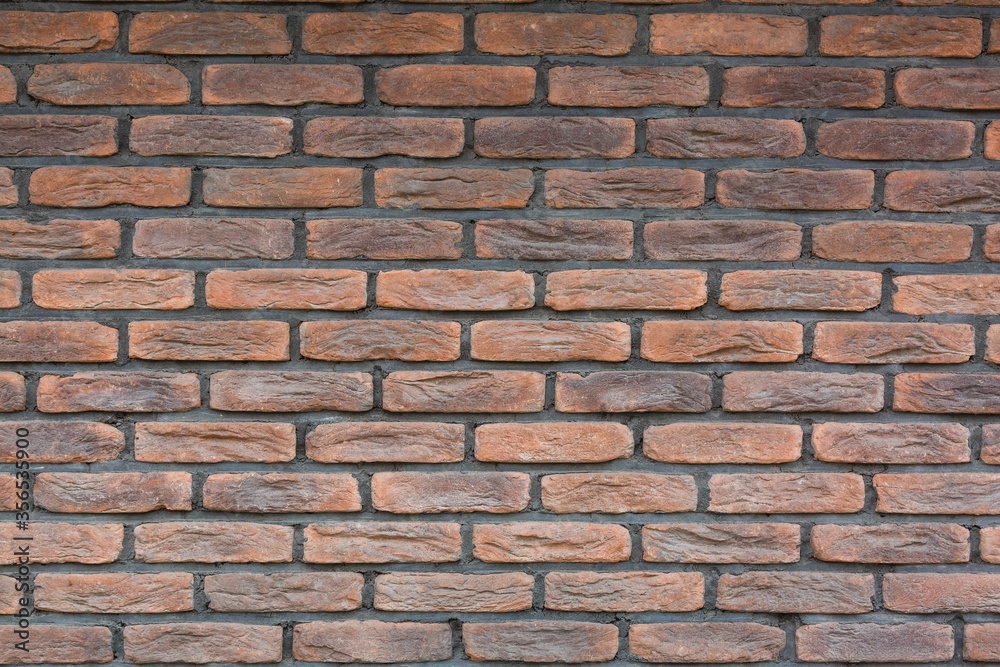 Obraz premium red brick wall texture grunge background with vignetted corners, may use to interior design
