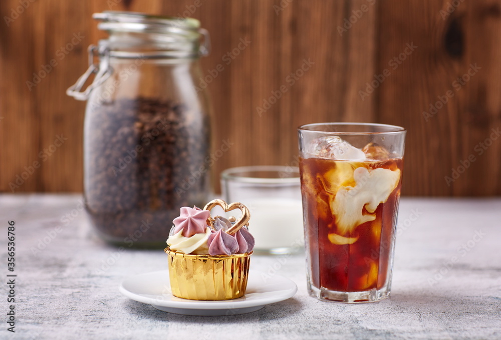 Appetizing cupcake with cream and coffee Appetizing cupcake with cream and coffee