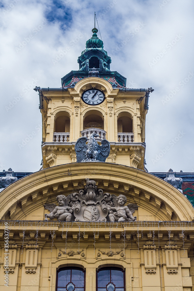 sculpture on the building and clock tower, Szeged, Hungary