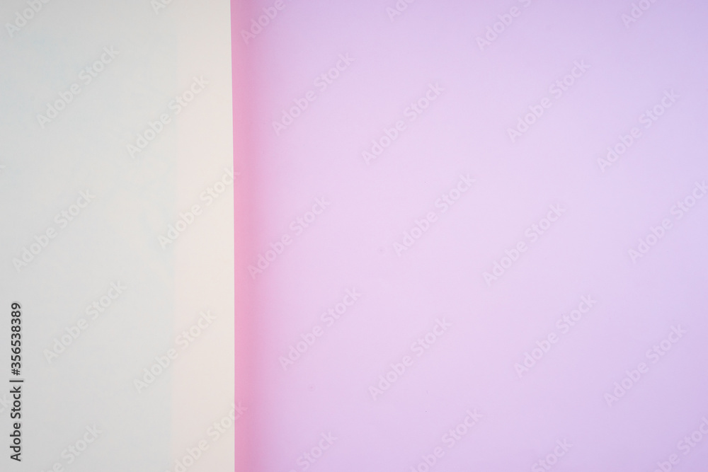 Creative arrangement of soft pastel colored papers creating an abstract background Creative arrangement of soft pastel colored papers creating an abstract background