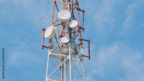 Cell tower antennas 3G, 4G или 5G, timelapse clouds in the sky.