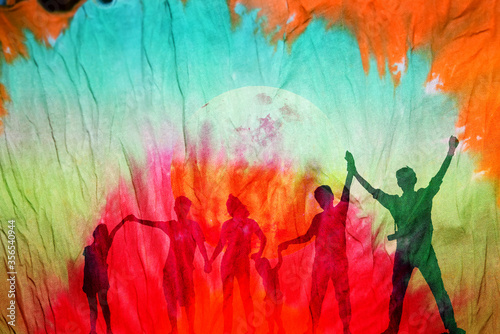 Shadow of happy family on colorful tie dye fabric background