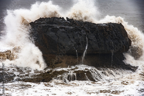 wave breaking on the rocks