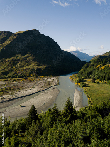 Aerial photos around Arthurs Point in Queenstown, New Zealand taken in the morning before the summer season with views of the shotover river, Coronet's peak, Queenstown hill and Bowen Peak.