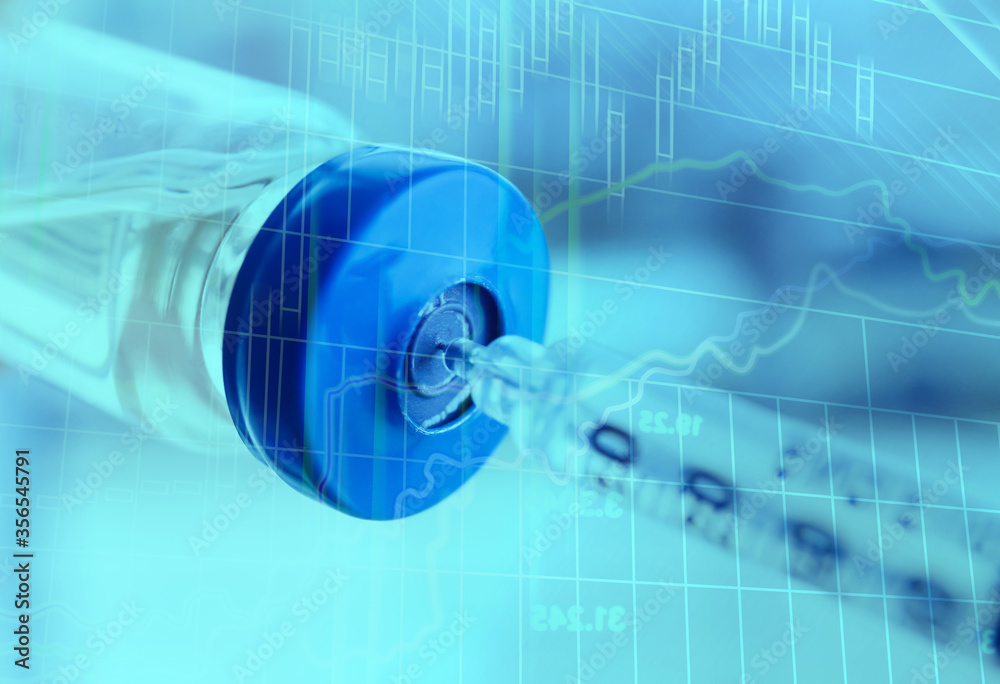 Vial with vaccine and syringe on blurred background. Covid-19 prevention Vial with vaccine and syringe on blurred background. Covid-19 prevention