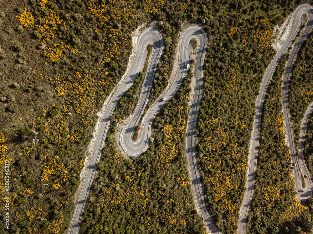 Aerial photos around Crown Range winding road taken in the afternoon during a road trip from