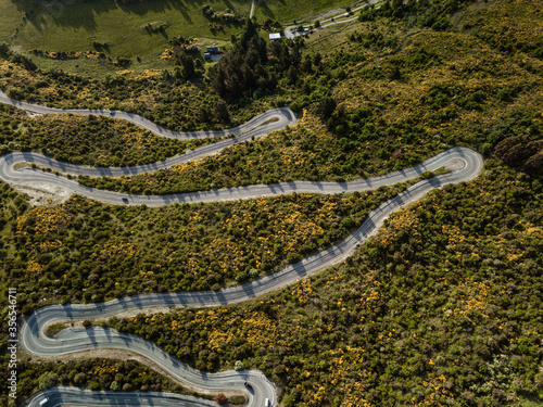 Aerial photos around Crown Range winding road taken in the afternoon during a road trip from Wanaka to Queenstown. photo