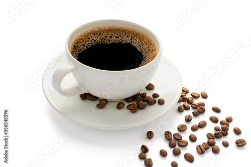 Close up of Hot fresh black coffee with milk foam in white ceramic cup with saucer and coffee beans roasted isolated on white background.