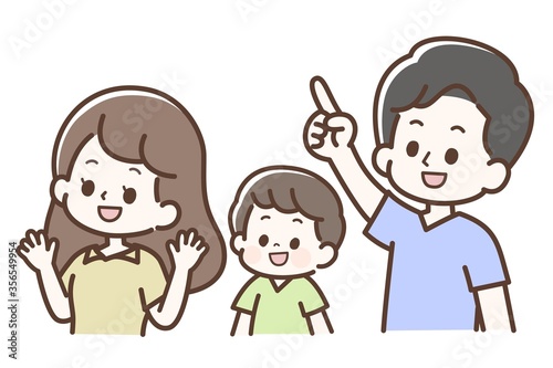 斜め上を指差す家族