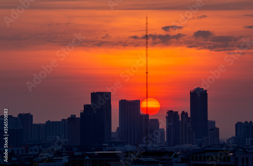 Sunrise in the city. Silhouette of buildings.
