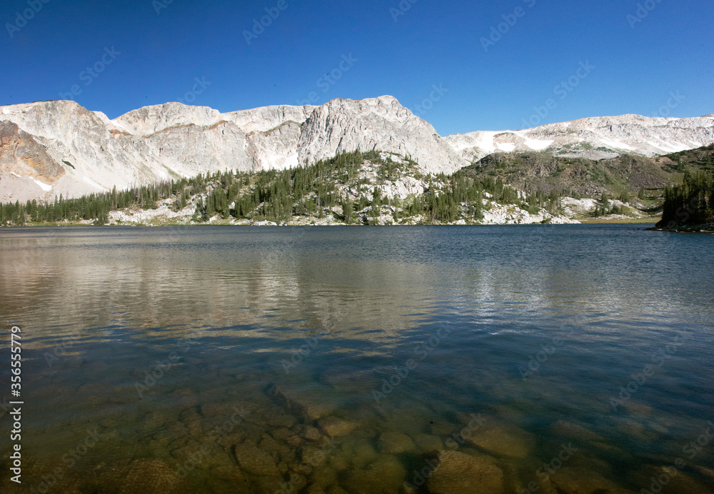 mountain reflection in lake in snowy range medicine bow Wyoming
