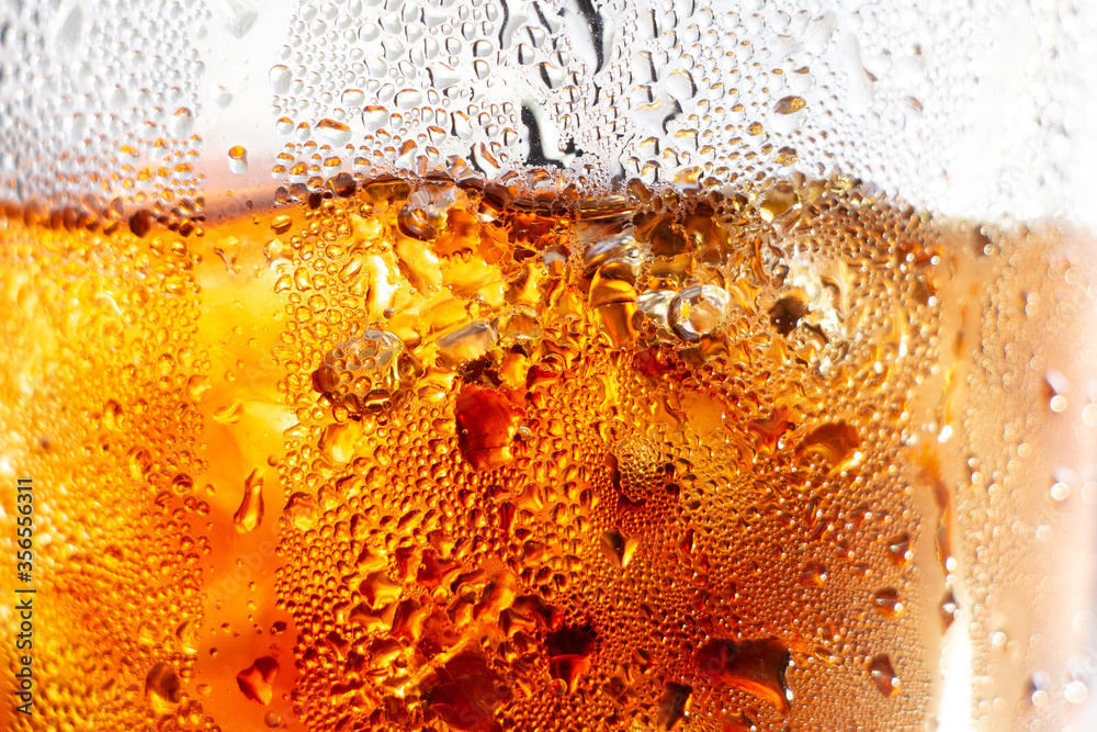 Refreshing Bubbly Soda Pop with Ice Cubes. Cold soda iced drink in a glasses - Selective focus Refreshing Bubbly Soda Pop with Ice Cubes. Cold soda iced drink in a glasses - Selective focus
