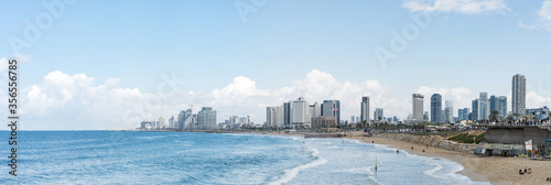 Panoramic view. Seascape and skyscrapers on background in Tel Aviv, Israel