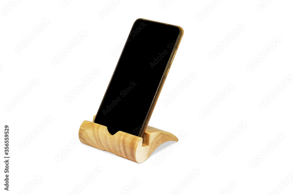 Phone holder or wood stand for smart phone on white background isolated image attach clipping path Phone holder or wood stand for smart phone on white background isolated image attach clipping path