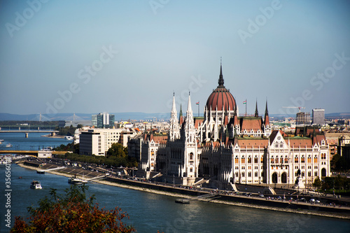 View landscape and cityscape of Budapest old town city and Hungarian Parliament with tour cruises in Danube Delta river and Budapest Chain Bridge in Budapest, Hungary © tuayai