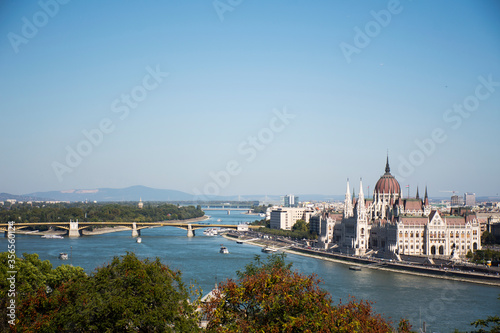 View landscape and cityscape of Budapest old town city and Hungarian Parliament with tour cruises in Danube Delta river and Budapest Chain Bridge in Budapest, Hungary