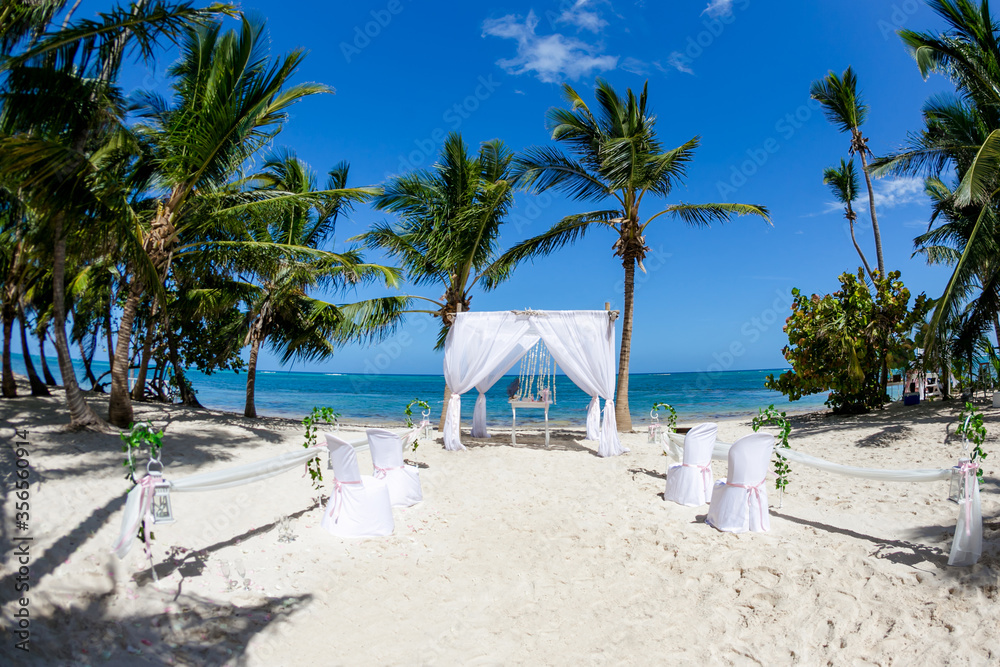 Φωτογραφία Colorful wedding arch gazebo pavilion made of bamboo and textile with fresh flow