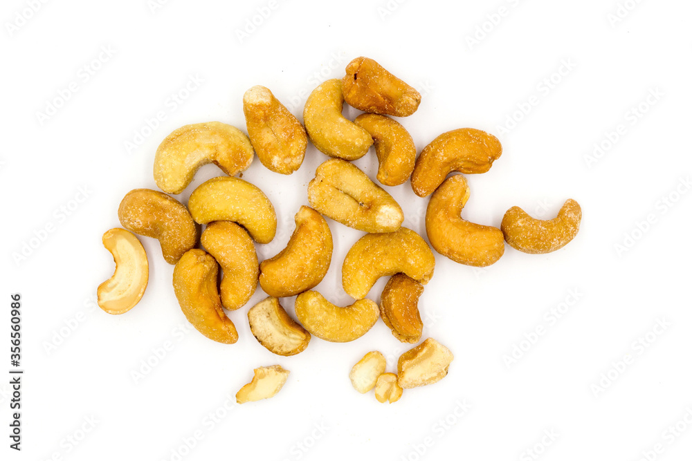 Roasted salted cashew nuts top view isolated on white background Roasted salted cashew nuts top view isolated on white background