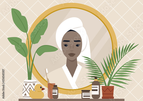 A mirror reflection, a Young black female character wearing a towel wrapped at the side of their head, daily body care routine, boho interior, natural patterns and plants