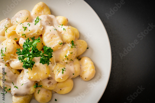 Gnocchi with mushroom cream sauce and cheese