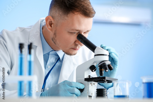 Scientist working with samp...