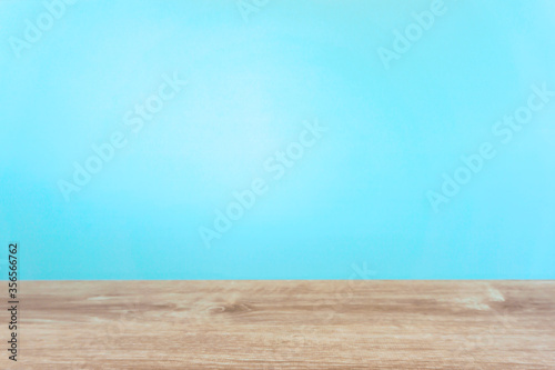 Background material of a light blue wall focused in the foreground. The product stands out. 焦点を手前にした水色の壁の背景素材 商品が際立ちます