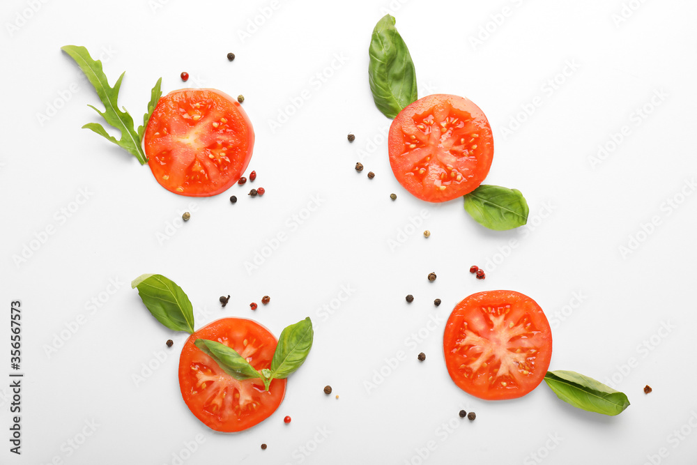 Fototapeta Composition with basil, tomatoes and spices on white background
