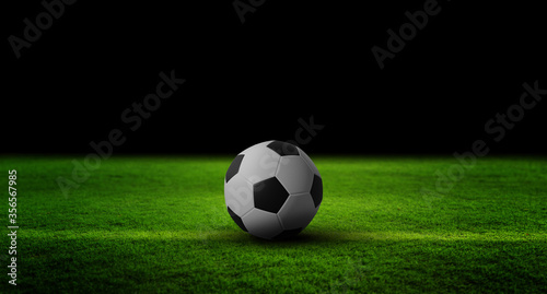 Soccer Ball on field on dark for you text © bank_jay