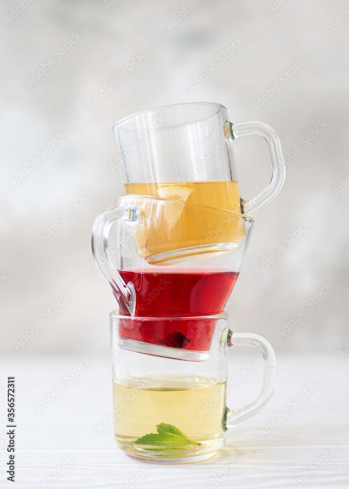 herbal tea and hibiscus tea in glass mugs herbal tea and hibiscus tea in glass mugs