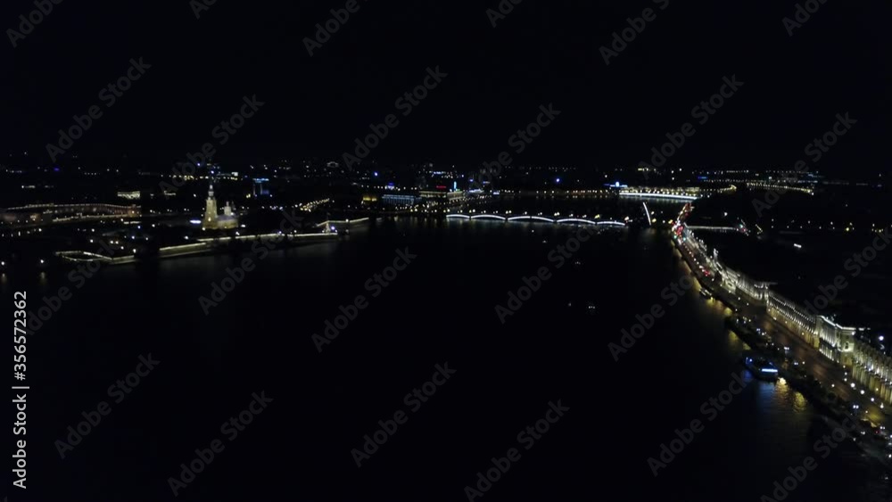 4K aerial night drone video of beautiful illuminated vintage architecture, Neva River, streets of Saint Petersburg city center and bridge draw at Neva River embankment of the Russia's northern capital 4K aerial night drone video of beautiful illuminated vintage architecture, Neva River, streets of Saint Petersburg city center and bridge draw at Neva River embankment of the Russia's northern capital